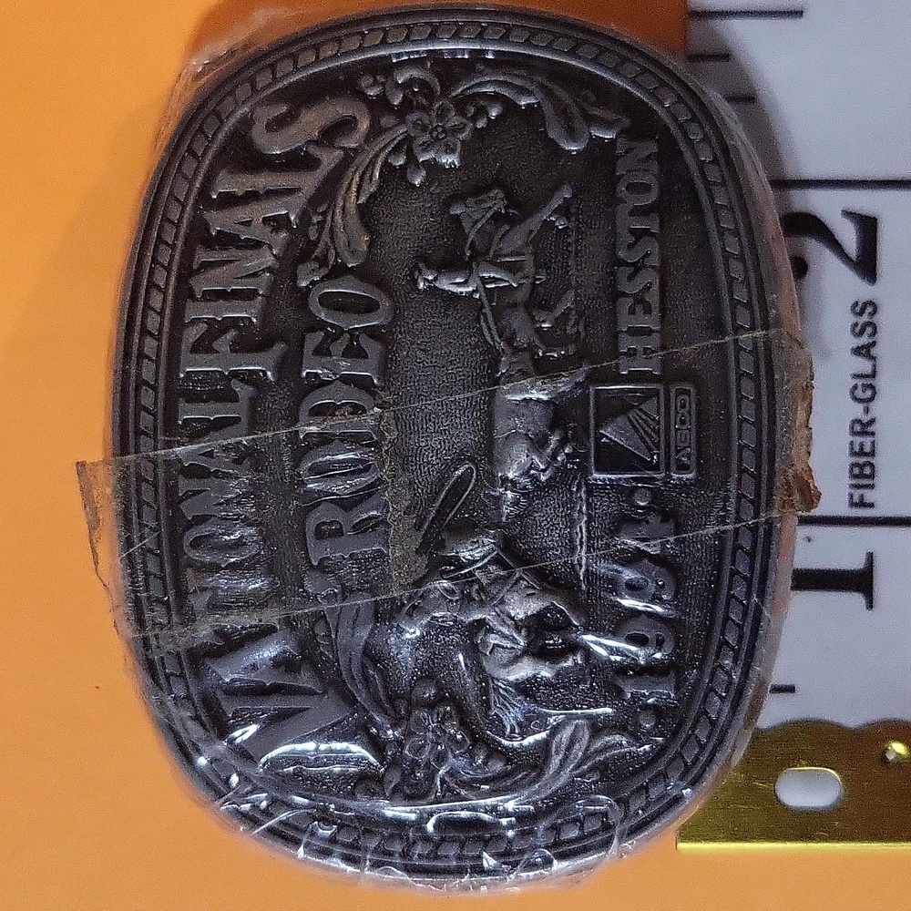 HESSTON NATIONAL FINALS RODEO KIDS BELT BUCKLE 1994